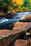 Fall river landscape with colorful autumn trees. Algonquin provincial park, Canada.