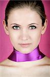 beauty portrait of a young woman with a ribbon