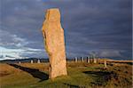 Ring of Brodgar in dramatic evening light and cloudscape