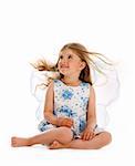 Isolated baby girl with long hair untwisted and fairy wings