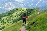 Hiker on the Top in the Alps - Seefelder Spitze ( 2220 m),  Austria.