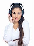 Beautiful young lady is liten to the music, isolated