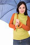 attractive brunette woman with umbrella over white background