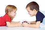 Little boy and girl with a plate of gingerbread cookies - isolated