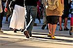 Crowd of people walking on a street