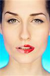 Portrait of beautiful woman with red lipstick