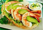 Delightful fresh shrimp and avocado open sandwich with lemon mayonnaise.