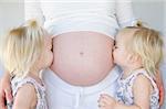 Twins Kissing Mom's Pregnant Belly