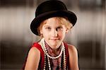 Funny young girl wearing a bowler hat