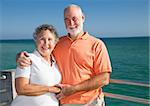 Portrait of a beautiful senior couple enjoying a seaside vacation.