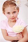 Beautiful small girl with the rose - for Mother's day