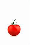 Image of a bright red single tomato on a white background