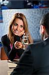 mid adult couple toasting in restaurant. Copy space