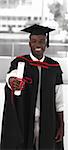 Man smilling at university graduation celebration