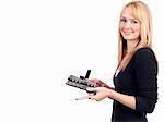 Beautiful blonde businesswoman holding her diary and a pen. Isolated on white background