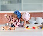 Young Children having fun in the Kitchen