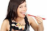 Beautiful young woman laughing while eating sushi. Isolated on white.