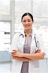 Potrait of a Happy Female Doctor with smiling at camera