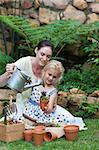 Young Mother and child Gardening