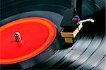 Vinyl record spinning on turntable close up