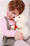 Portrait of cute cute little girl with teddy