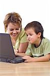 Woman teaching little boy how to use computers - isolated