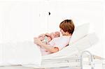 Young Woman in Hospital with her Baby