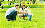 Parents catching their son in the park