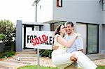 Young couple celebrating their new house