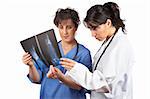 Two female doctors examining x-ray isolated on white background