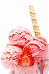 Delicious strawberry ice cream in glass bowl isolated on white background. Shallow depth of field