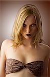 fashion portrait of pretty sensual blond looking in camera angry