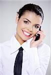 Portrait of beautiful business woman using mobile phone