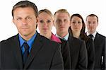 Group Of Business People In A Line Looking Serious