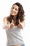 Closeup portrait of a beautiful young  woman showing thumbs up sign