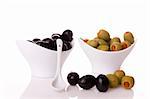 Black and green olives isolated on  a white background