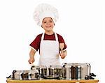 Feel the beat of culinary art - boy with wooden spoons making some noise banging cooking pots, isolated