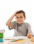 Schoolboy thinking about his homework - isolated