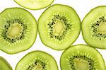 Kiwi green transparent slices over white background