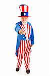 Full body isolated view of American icon Uncle Sam in the classic I Want You pose.