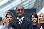 Afro-American young businessman leading his team