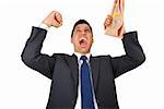 energetic businessman with his arms raised