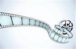 Vector illustrator of movie reel with a strip of exposed frames