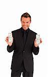 Successful young businessman holding money in his hands