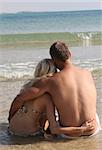 Couple relaxing on the beach