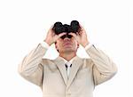 Portrait of a confident businessman looking upwards through binoculars