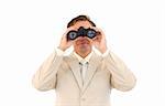 Serious caucasian businessman using binoculars isolated against white