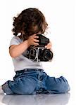 child with old SLR camera