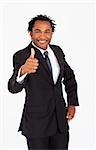Handsome afro-american businessman with thumb up