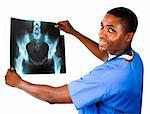 Doctor in Blue scrubs holding an x-ray